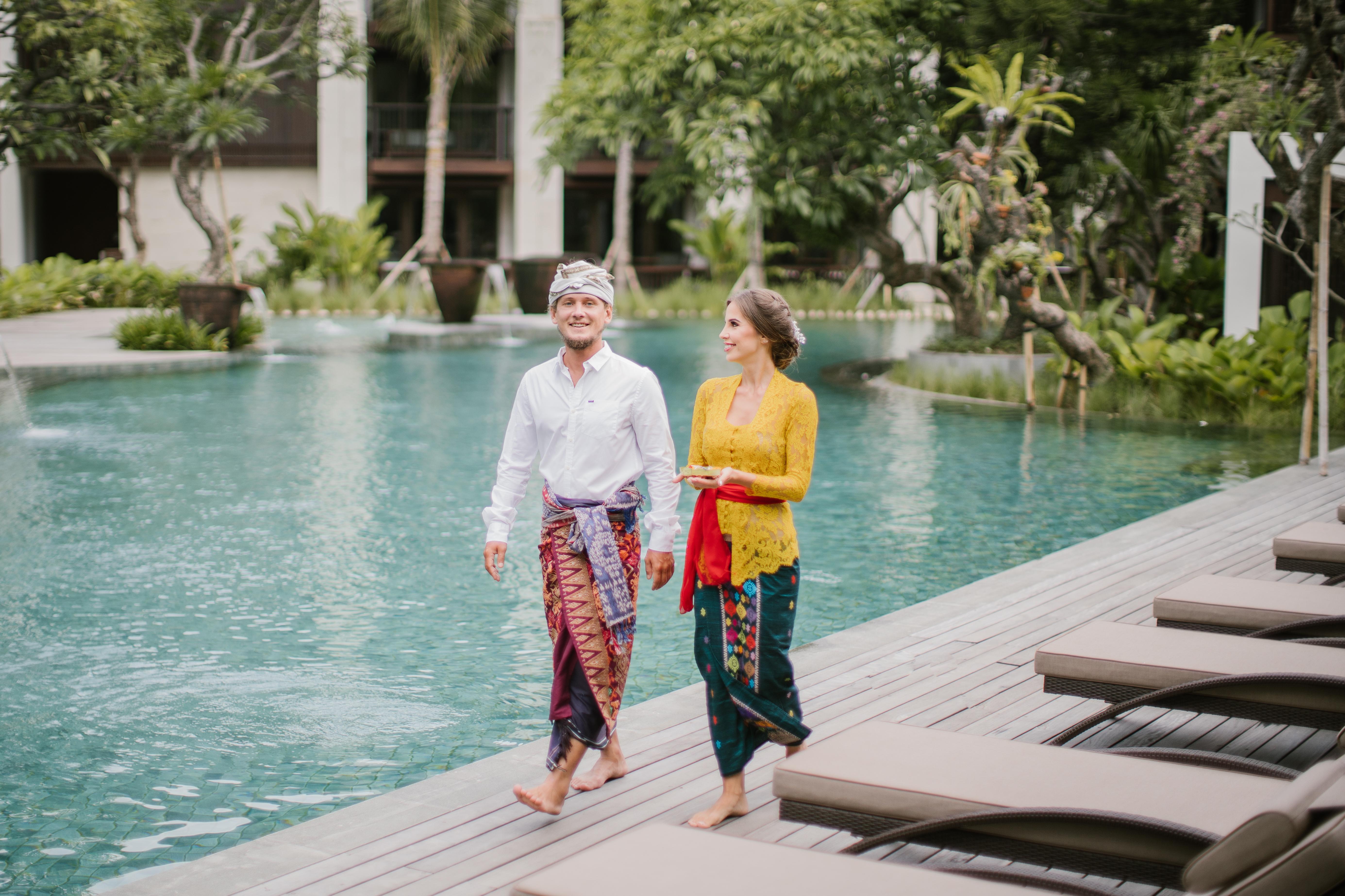 Ramayana Suites And Resort Кута Екстериор снимка A Balinese couple wearing traditional Balinese attire